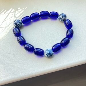 Blue Glass Beaded Bracelet with White Accents